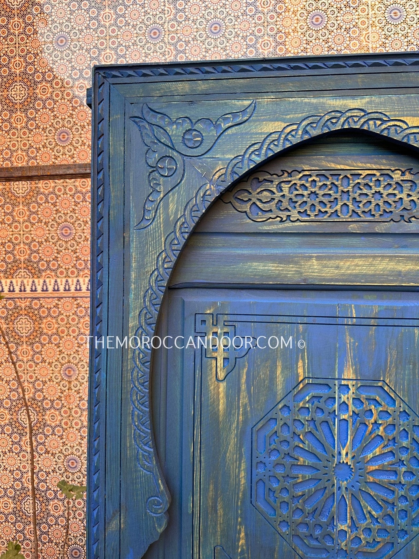 With This Custom Carved Moroccan Blue Door, you can bring the magic of Morocco into your home.