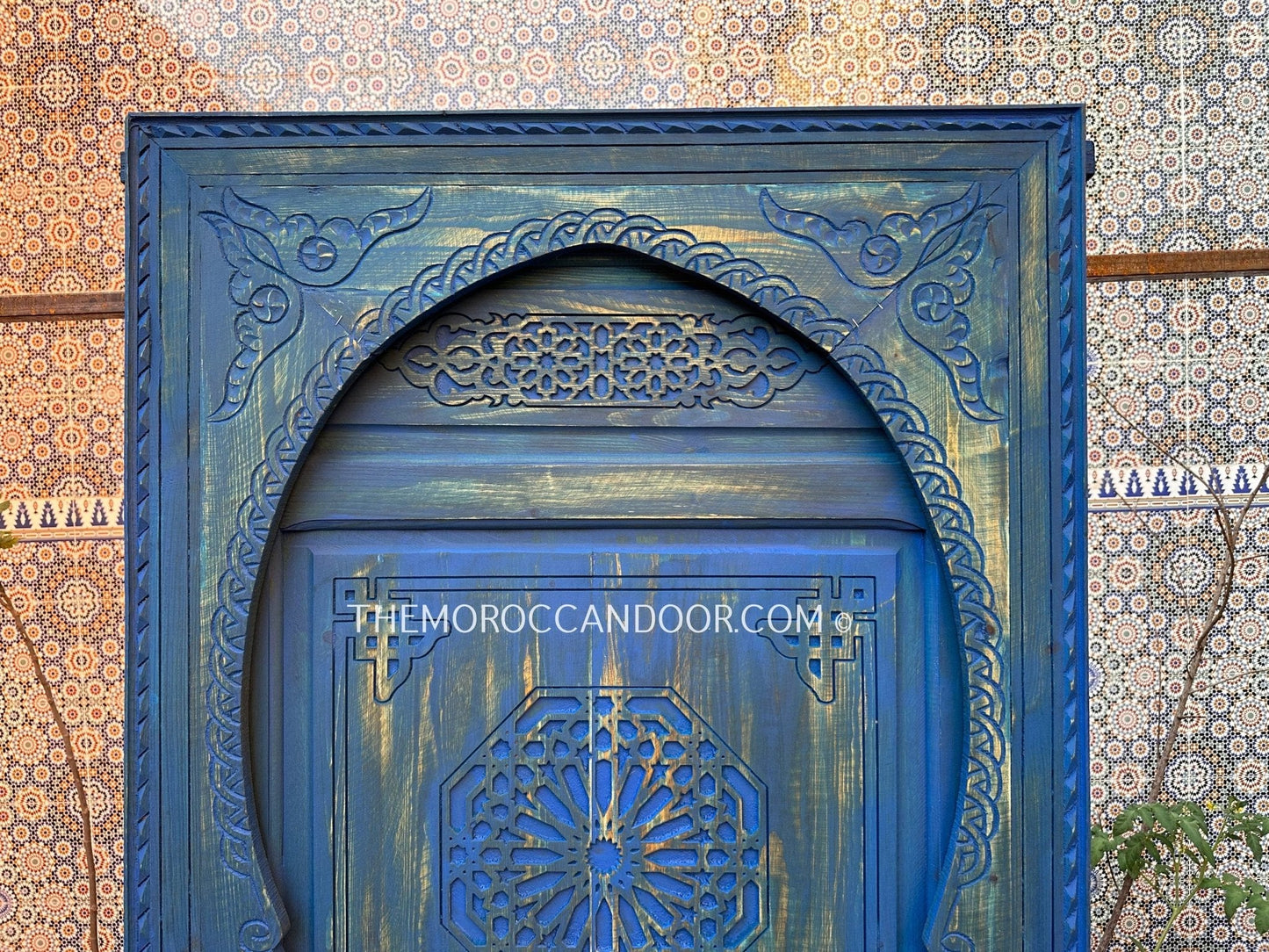 With This Custom Carved Moroccan Blue Door, you can bring the magic of Morocco into your home.