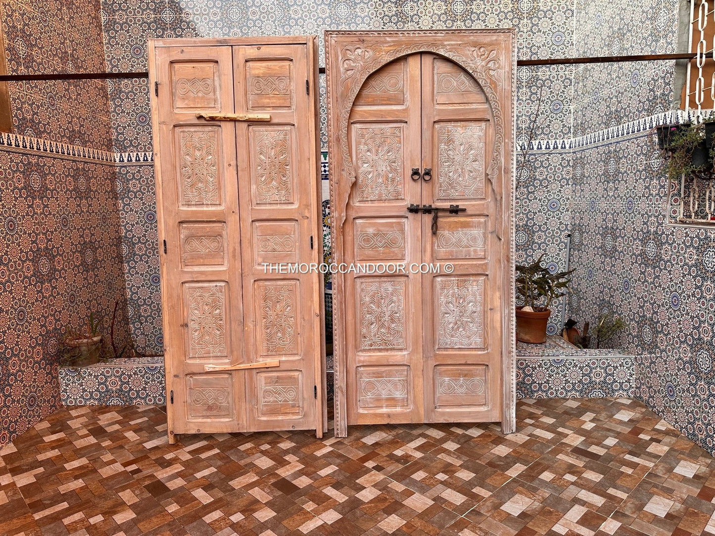 The tranquility and enchantment of Morocco enters your home through this exquisitely carved white door.